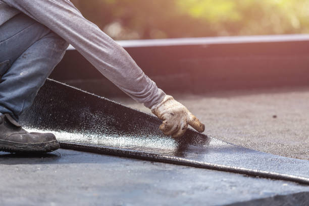 Professional Basement Waterproofing technician working in Halethorpe, MD